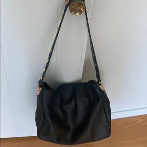 Black leather purse with gold studding